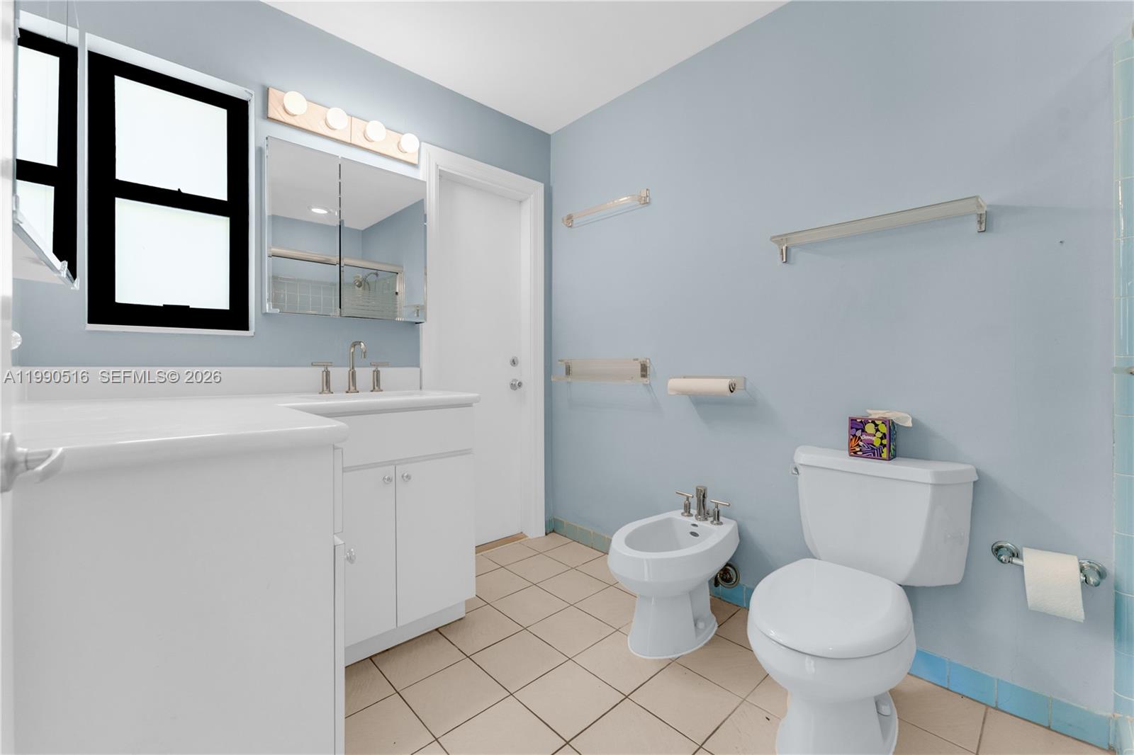 10020 Southwest 102nd Ave Road Miami, FL 33176 - Photo 13 of 27 a bathroom with a sink toilet vanity and window