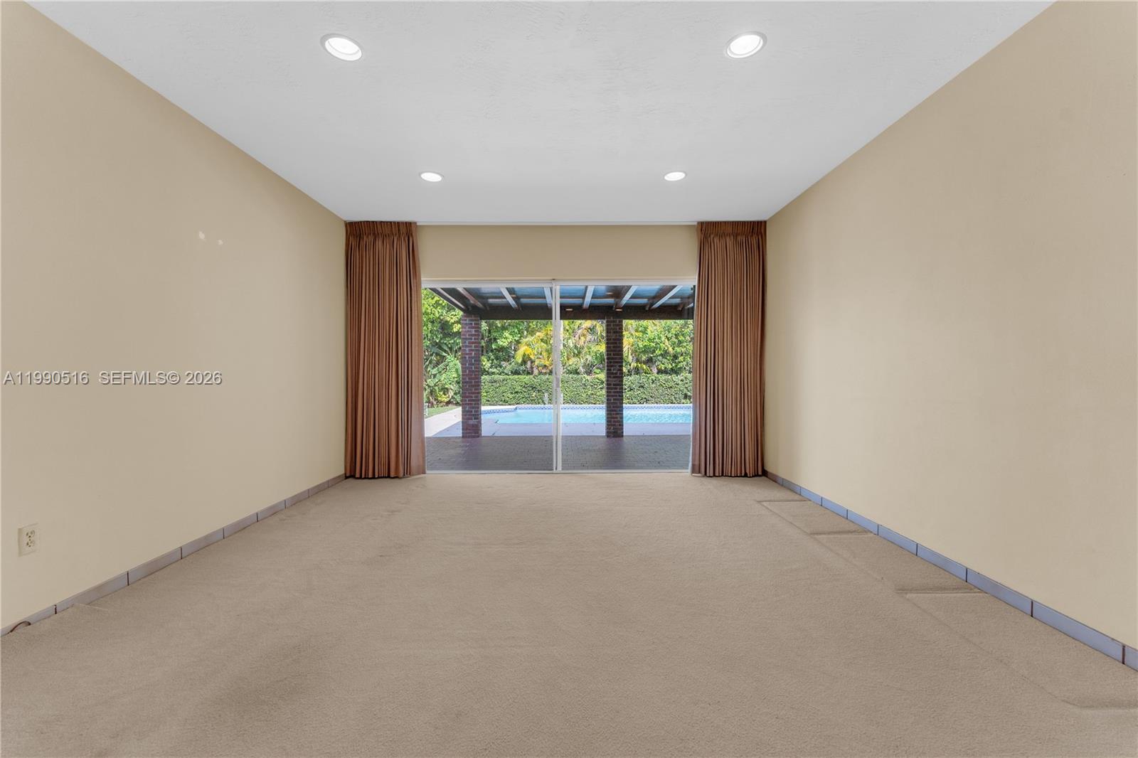 10020 Southwest 102nd Ave Road Miami, FL 33176 - Photo 3 of 27 a view of an empty room with a window