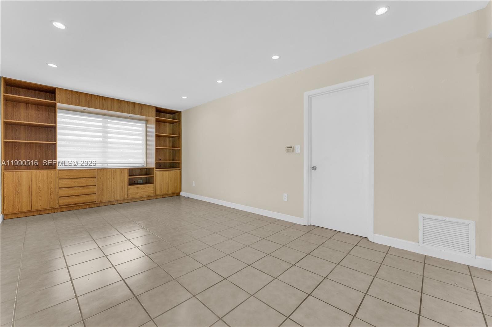 10020 Southwest 102nd Ave Road Miami, FL 33176 - Photo 10 of 27 a view of an empty room with a window