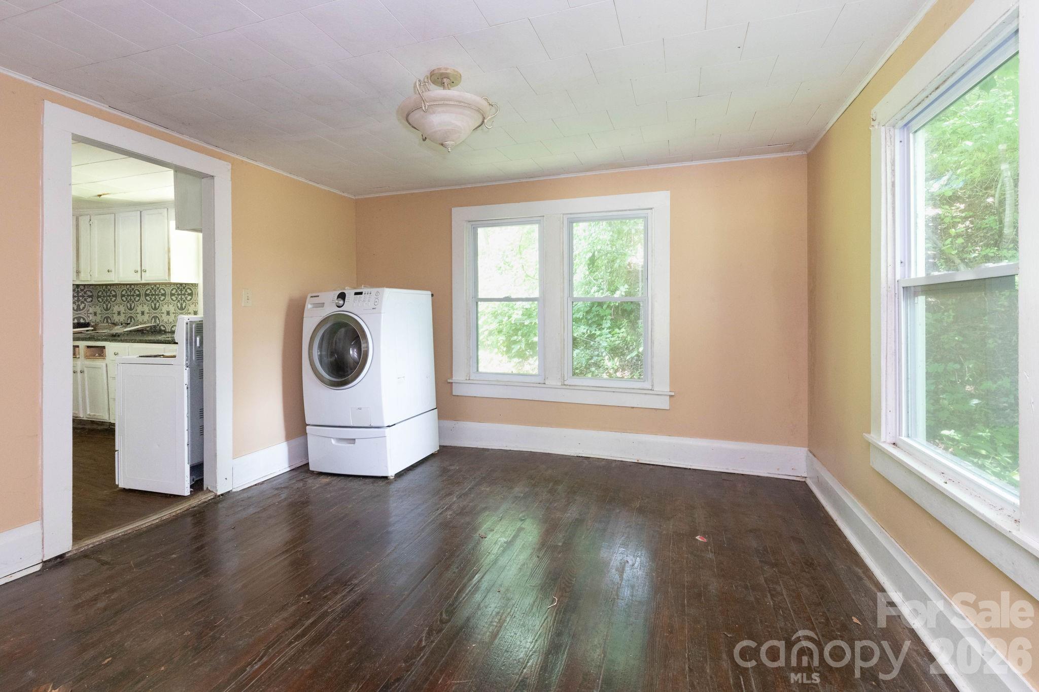 4085 Jacks Creek Road Burnsville, NC 28714 - Photo 14 of 24 a view of a room with wooden floor and windows