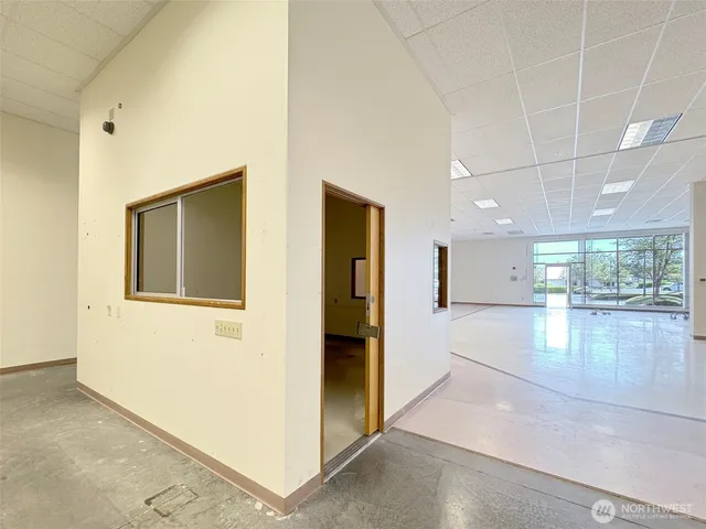 an empty room with windows