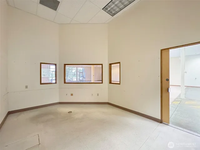 an empty room with windows