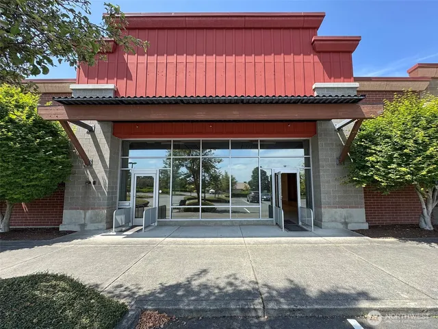 a view of a house with entrance gate