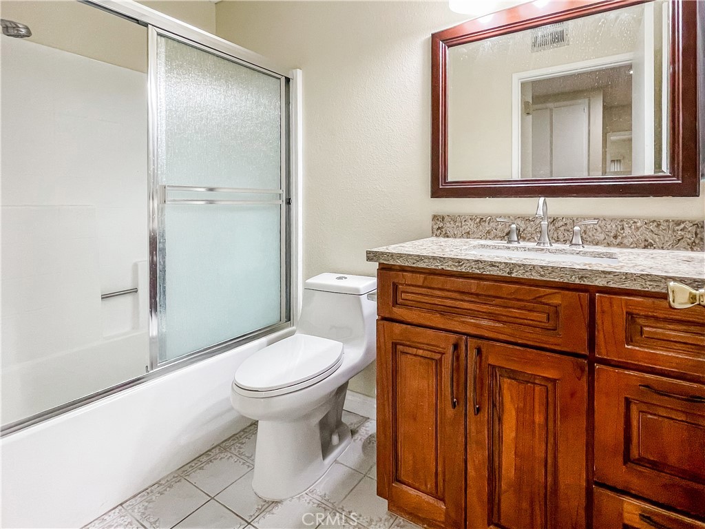598 Armitos Place Diamond Bar, CA 91765 - Photo 13 of 26 a bathroom with a sink a toilet and shower