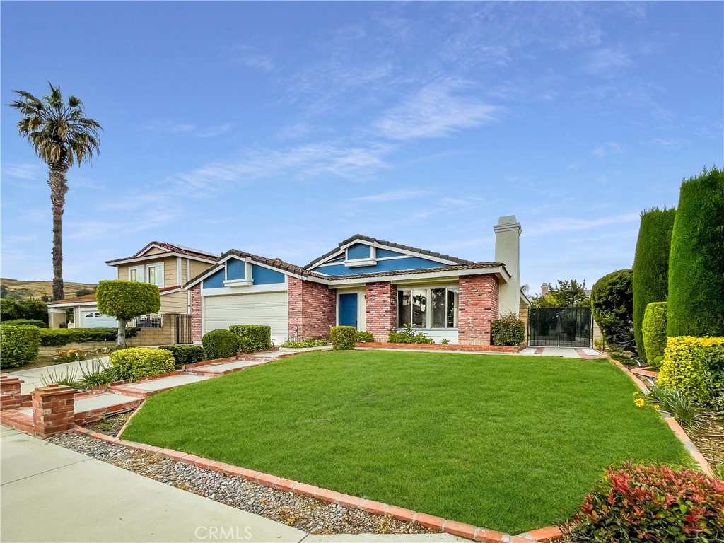598 Armitos Place Diamond Bar, CA 91765 - Photo 23 of 26 a front view of a house with a yard
