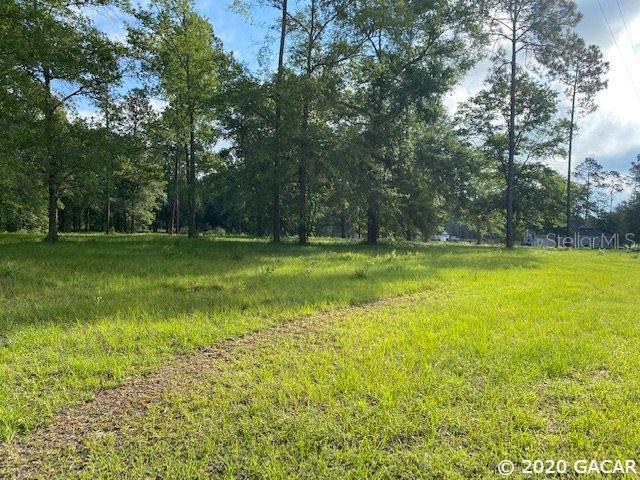 0 Turkey Ridge Lake Butler, FL 32054 - Photo 1 of 1 a swimming pool with wooden fence