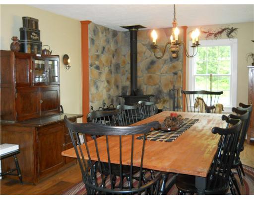 301 Harbison Road Sarver, PA 16055 - Photo 8 of 18 Kitchen. Plenty of room for the family to share meals as they discuss the day and enjoy the warmth from the wood burning stove.
