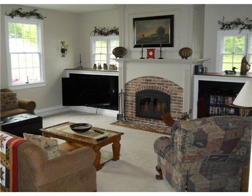 301 Harbison Road Sarver, PA 16055 - Photo 9 of 18 Family Room. The family room is flooded with light...snuggle up and enjoy the fire or gather to watch the game.