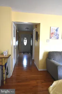 a view of livingroom with furniture and wooden floor