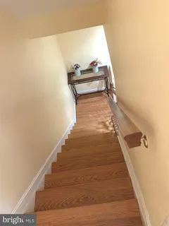 a view of a hallway with an empty room