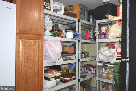 a view of a room with shelves