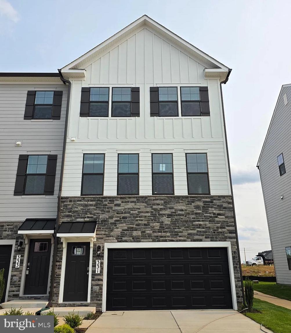331 Ensemble Way Frederick, MD 21701 - Photo 1 of 27 Modern Exterior with Stone Accent & 2-Car Garage