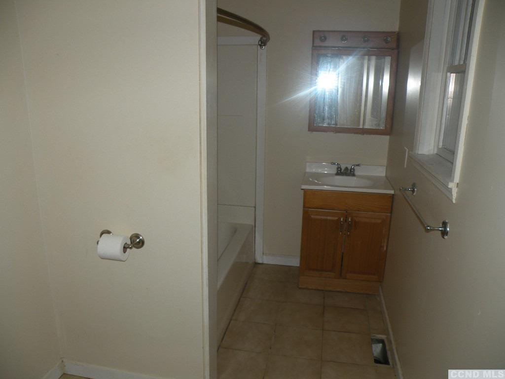 618 Bean River Road Pine Plains, NY 12546 - Photo 11 of 15 a bathroom with a sink and mirror