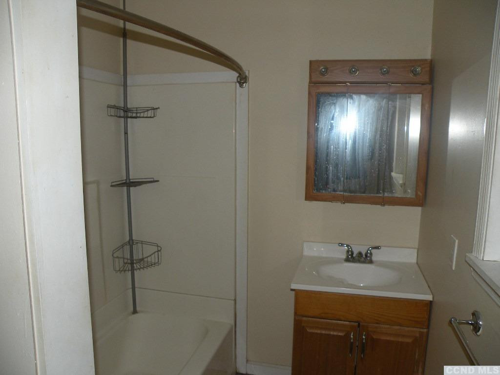 618 Bean River Road Pine Plains, NY 12546 - Photo 12 of 15 a bathroom with a sink and mirror