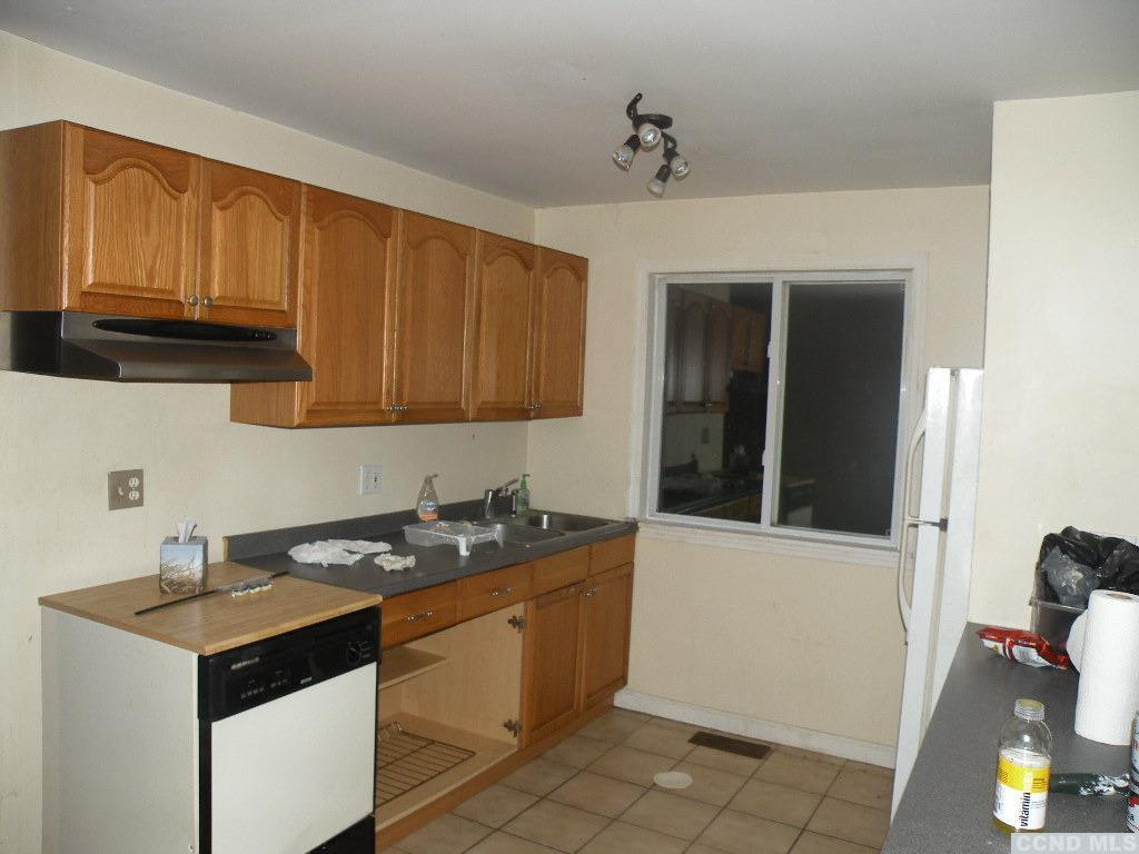 618 Bean River Road Pine Plains, NY 12546 - Photo 6 of 15 a kitchen with a sink and cabinets