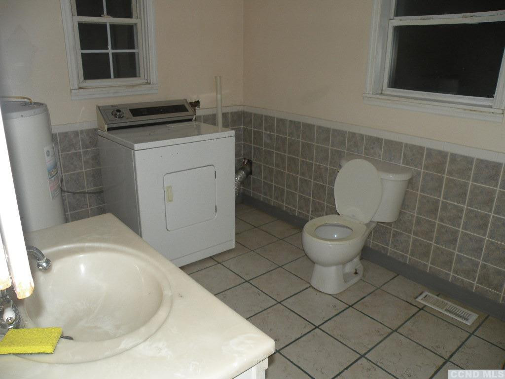 618 Bean River Road Pine Plains, NY 12546 - Photo 7 of 15 a bathroom with a toilet and a sink