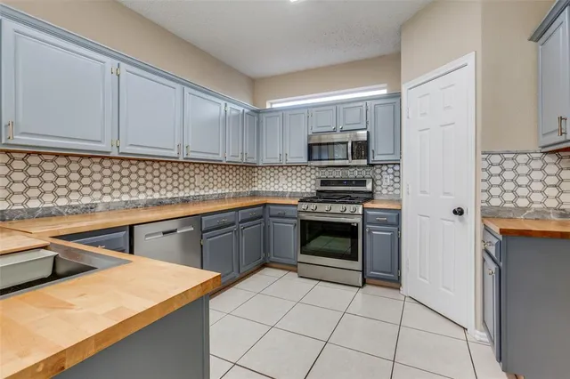 $419,000 | 2120 Arbor Creek Drive, Carrollton, TX 75010