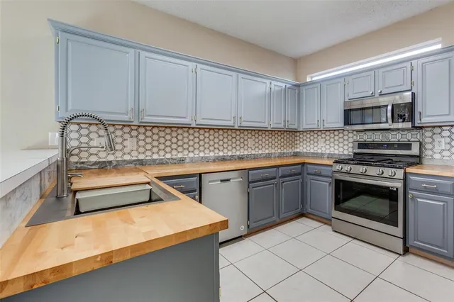 $419,000 | 2120 Arbor Creek Drive, Carrollton, TX 75010