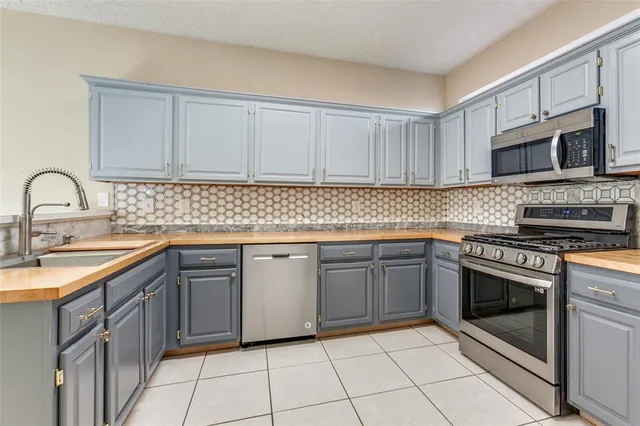 $419,000 | 2120 Arbor Creek Drive, Carrollton, TX 75010