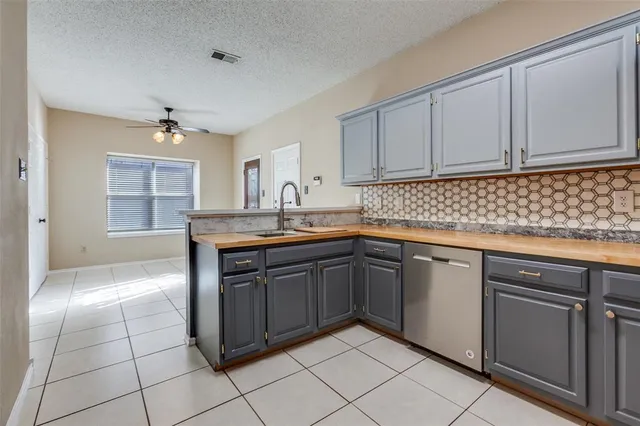 $419,000 | 2120 Arbor Creek Drive, Carrollton, TX 75010