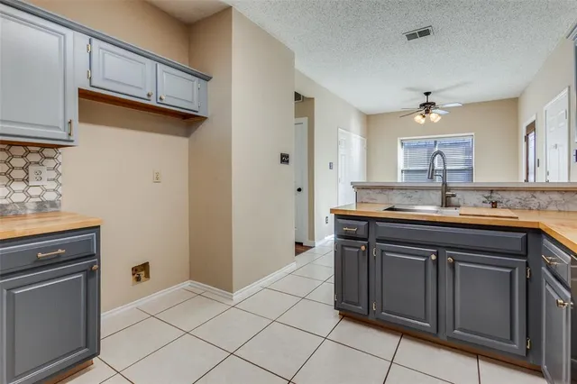 $419,000 | 2120 Arbor Creek Drive, Carrollton, TX 75010