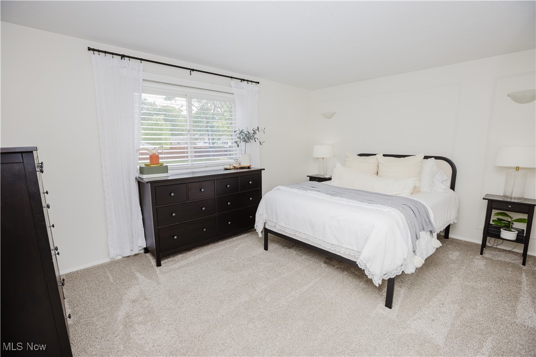 16940 Howe Road Strongsville, OH 44136 - Photo 24 of 33 Bedroom featuring light carpet and baseboards