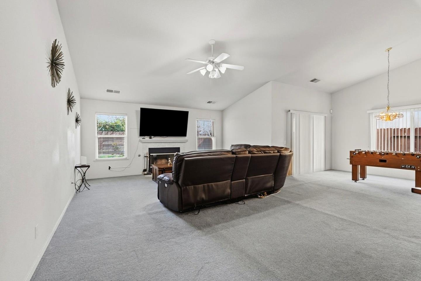 3882 Pintail Court Merced, CA 95340 - Photo 5 of 21 a living room with furniture and a flat screen tv