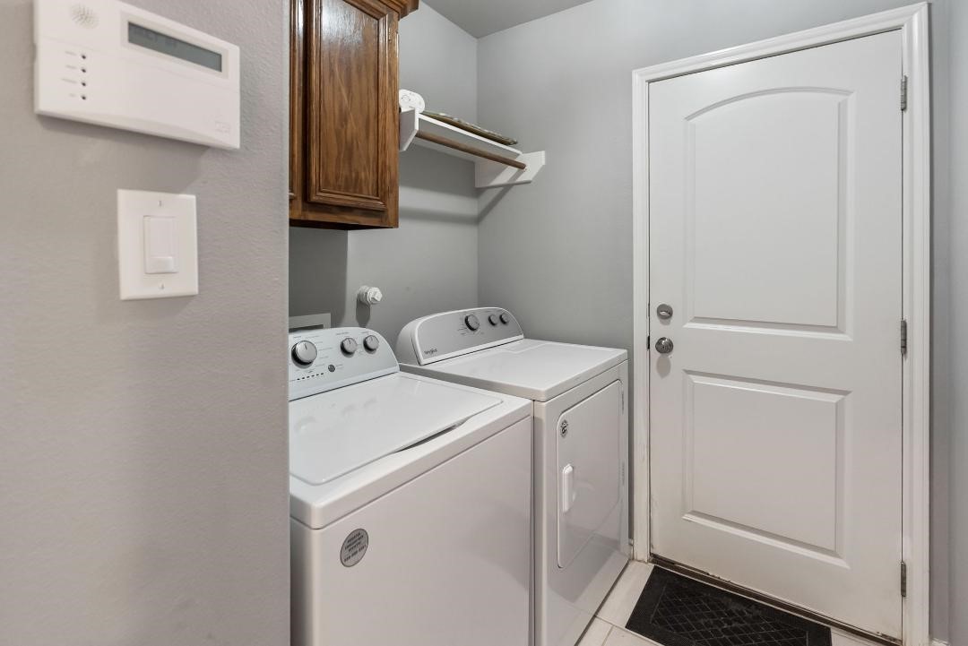 4328 Bratton Road Corpus Christi, TX 78413 - Photo 18 of 24 a utility room with dryer and washer