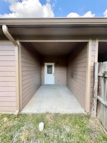 a house view with a garden space