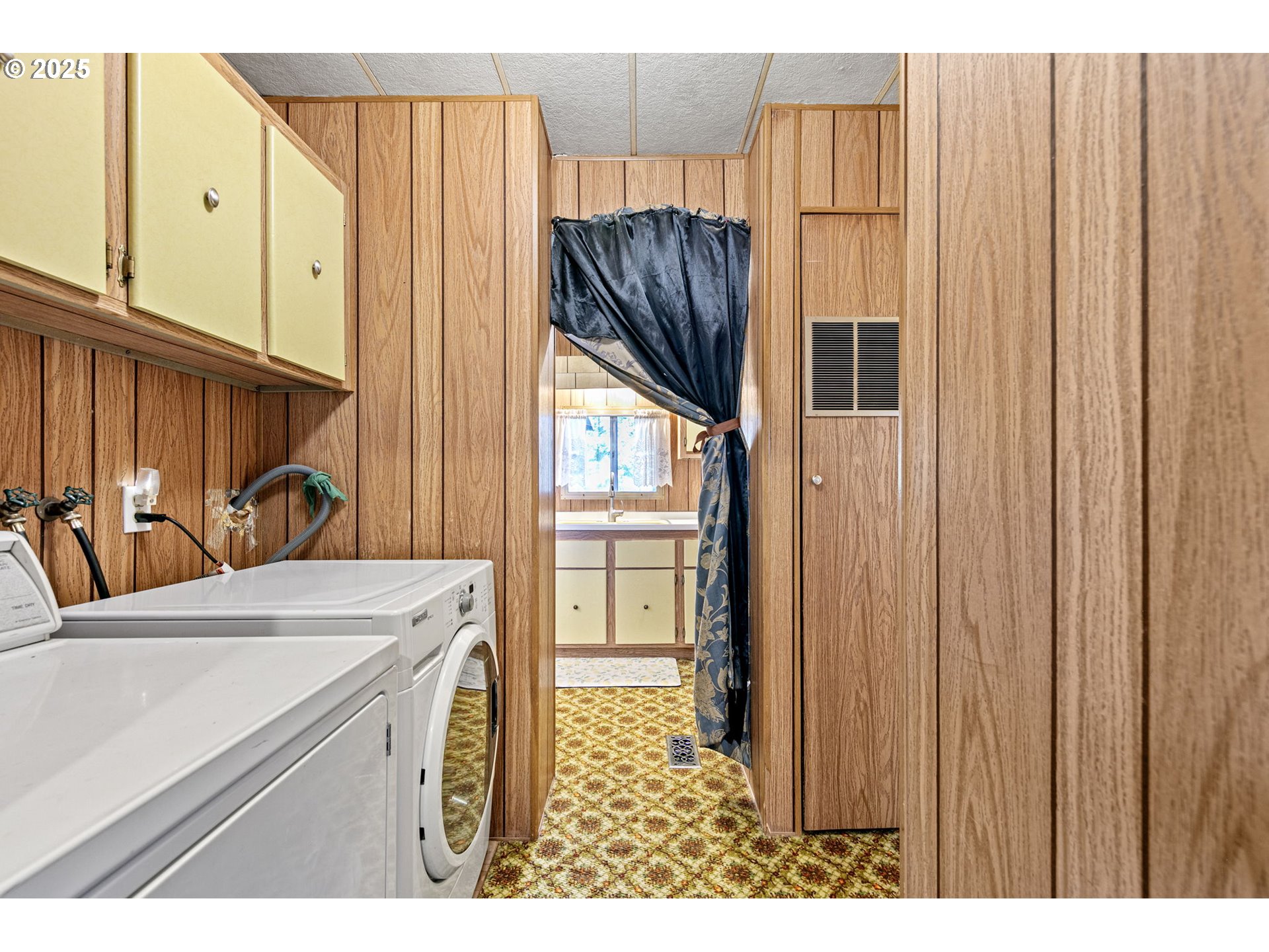 44531 McKenzie Highway Leaburg, OR 97489 - Photo 26 of 48 a kitchen with stainless steel appliances a refrigerator and a sink