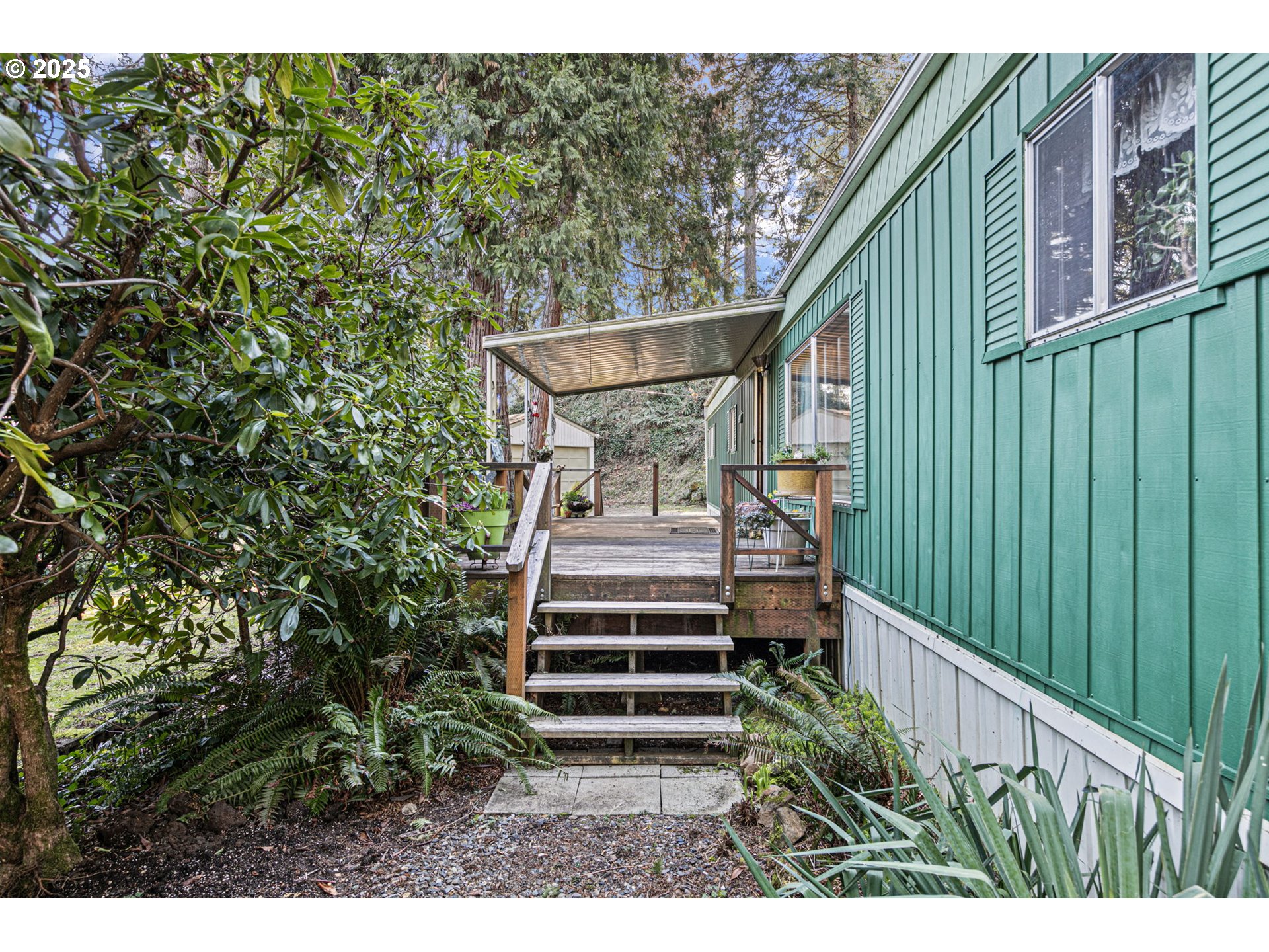 44531 McKenzie Highway Leaburg, OR 97489 - Photo 4 of 48 a view of a house with a yard