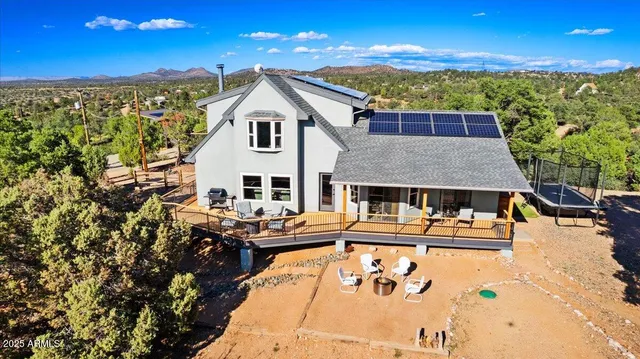 a view of a house with swimming pool