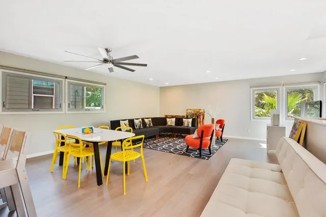a view of a dining room with furniture window and outside view