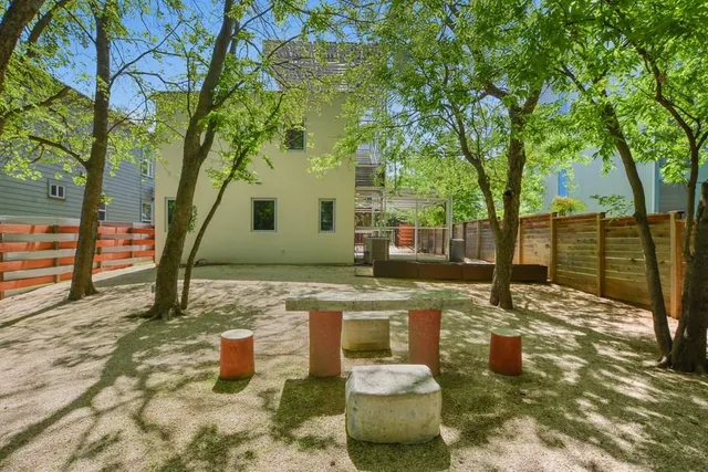 a view of a yard with trees