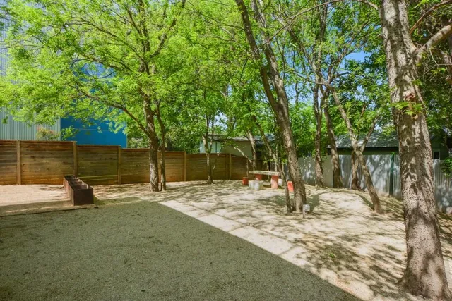 a backyard of a house with lots of green space
