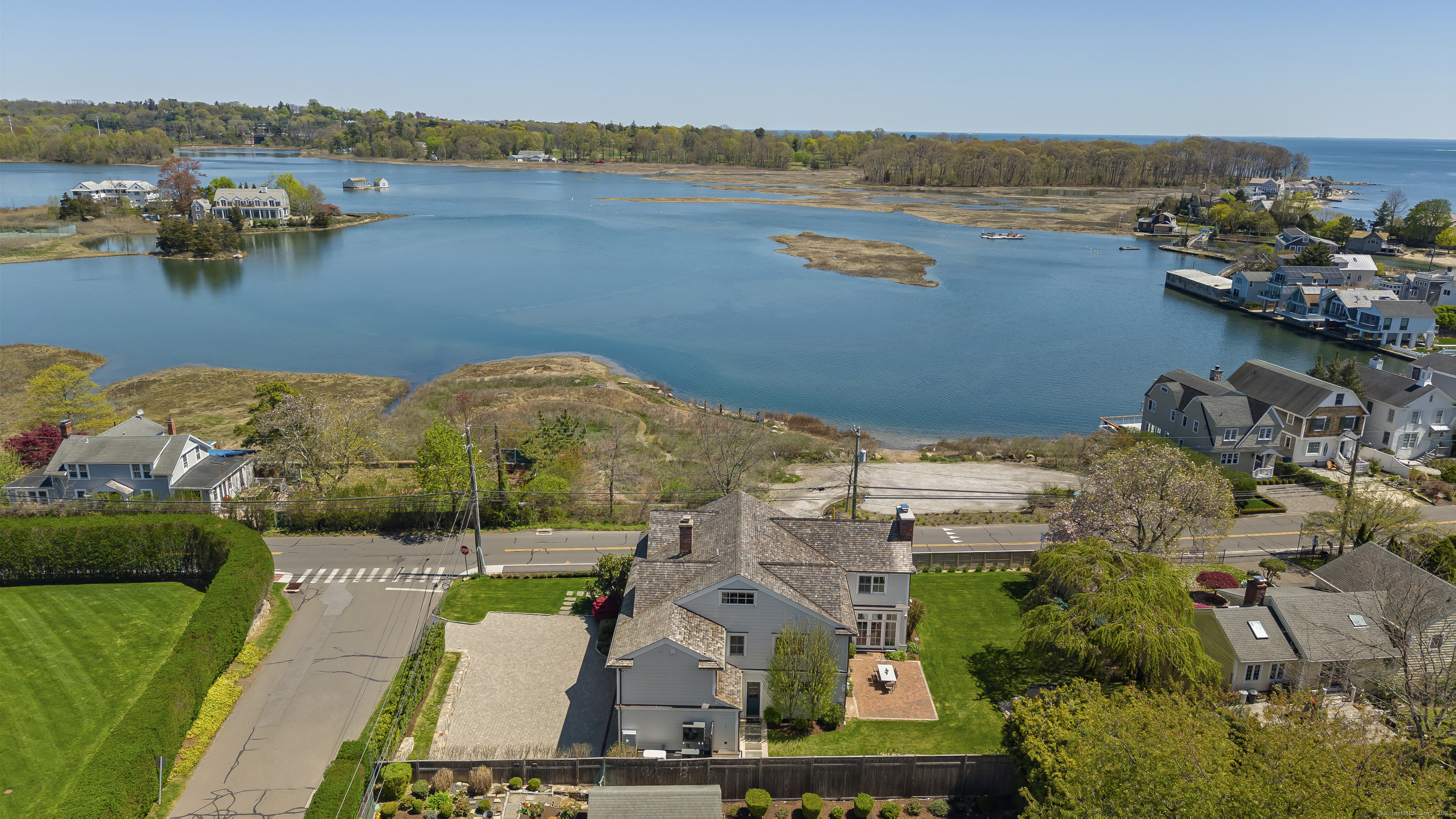 Embrace 130 feet of unobstructed scenic water views right from your front steps at 190 Hillspoint Road