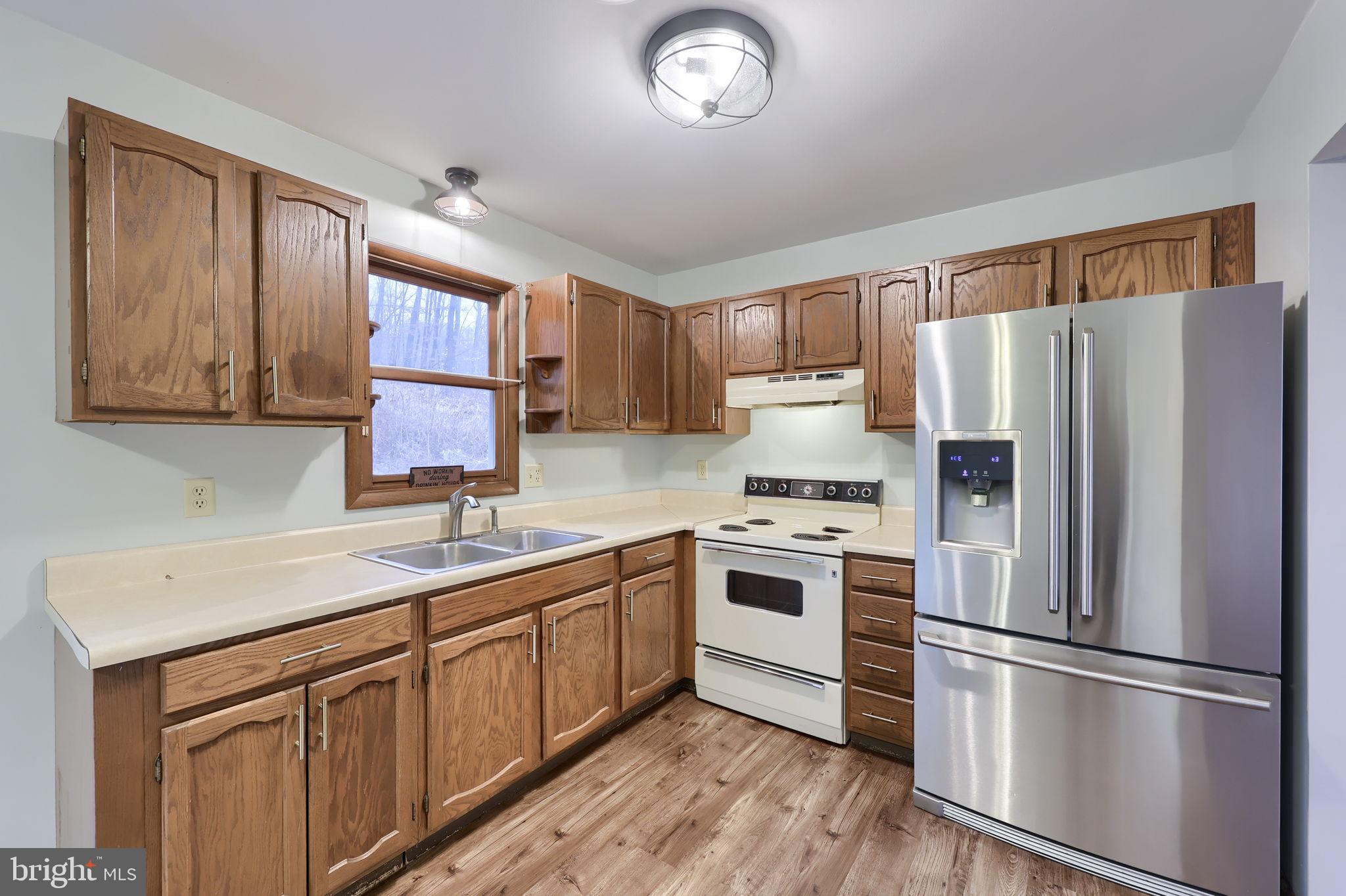 116 Ironmaster Road Lebanon, PA 17042 - Photo 29 of 64 Modern kitchen with warm wood accents.