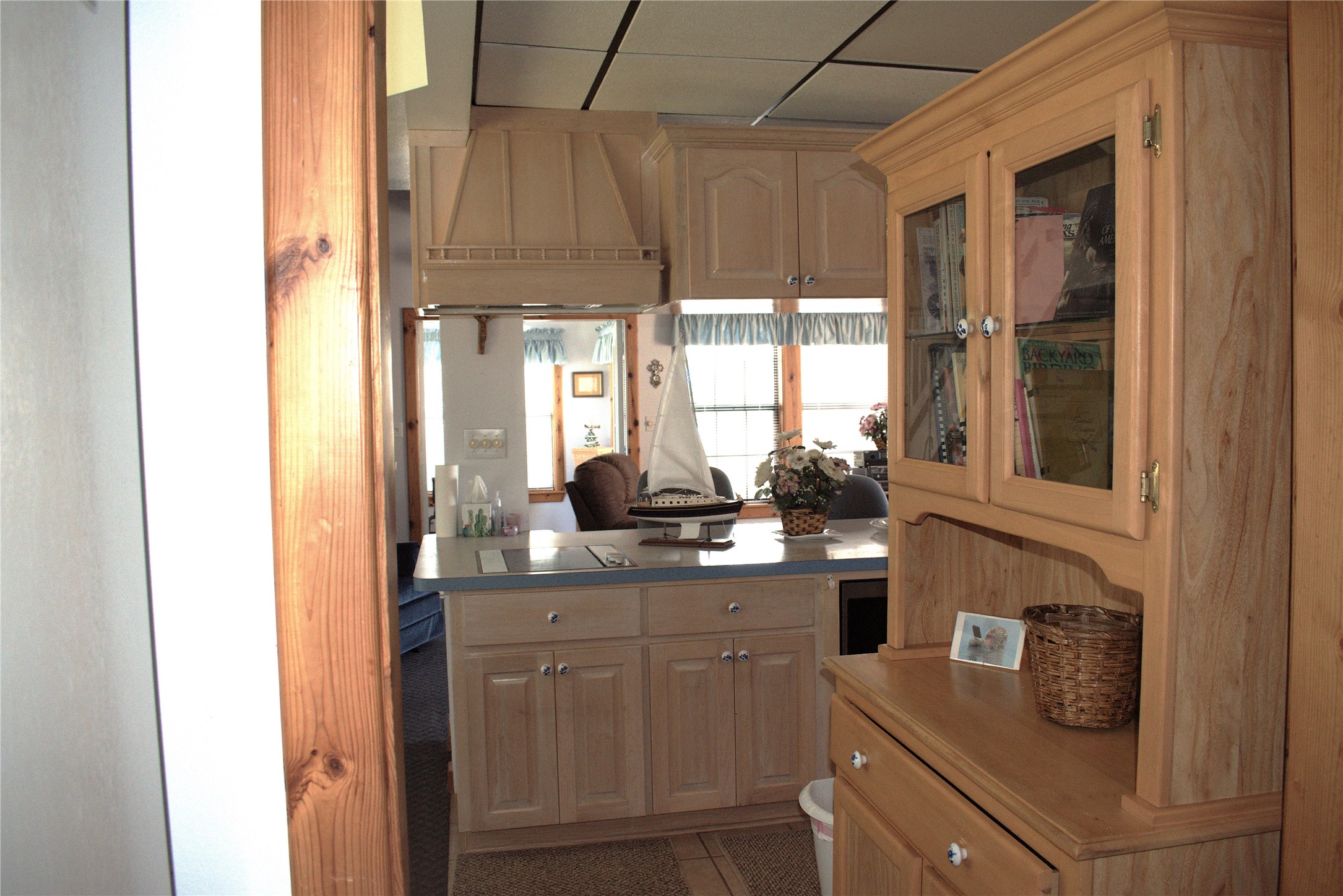 1657 County Road Sargent, TX 77414 - Photo 38 of 46 a kitchen with a sink a window and cabinets