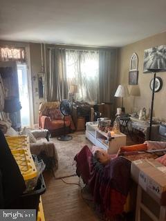 3316 Cardenas Avenue Baltimore, MD 21213 - Photo 5 of 8 a living room with furniture and a window