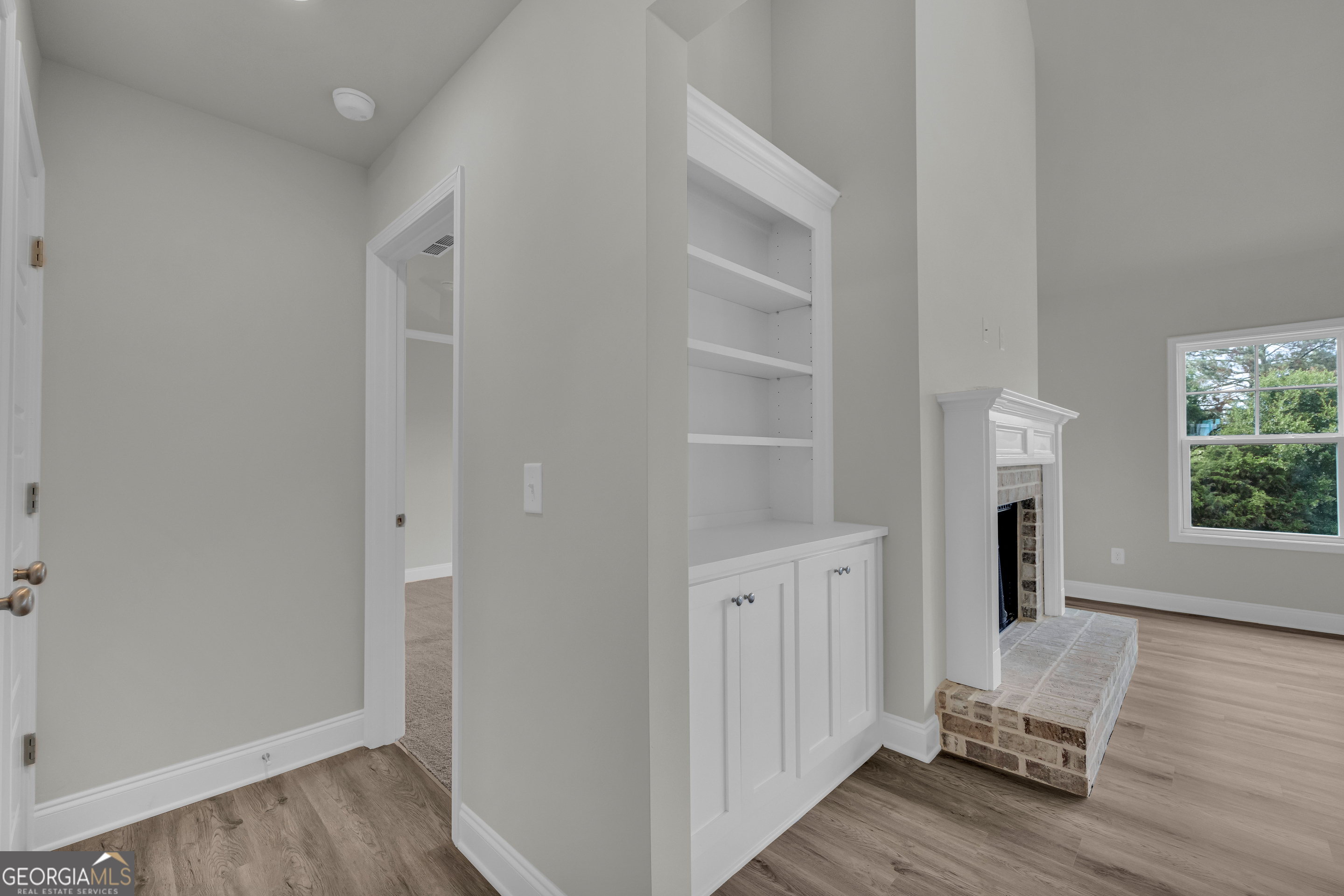 110 Sewell Road Lavonia, GA 30553 - Photo 13 of 73 a view of a livingroom with wooden floor and furniture