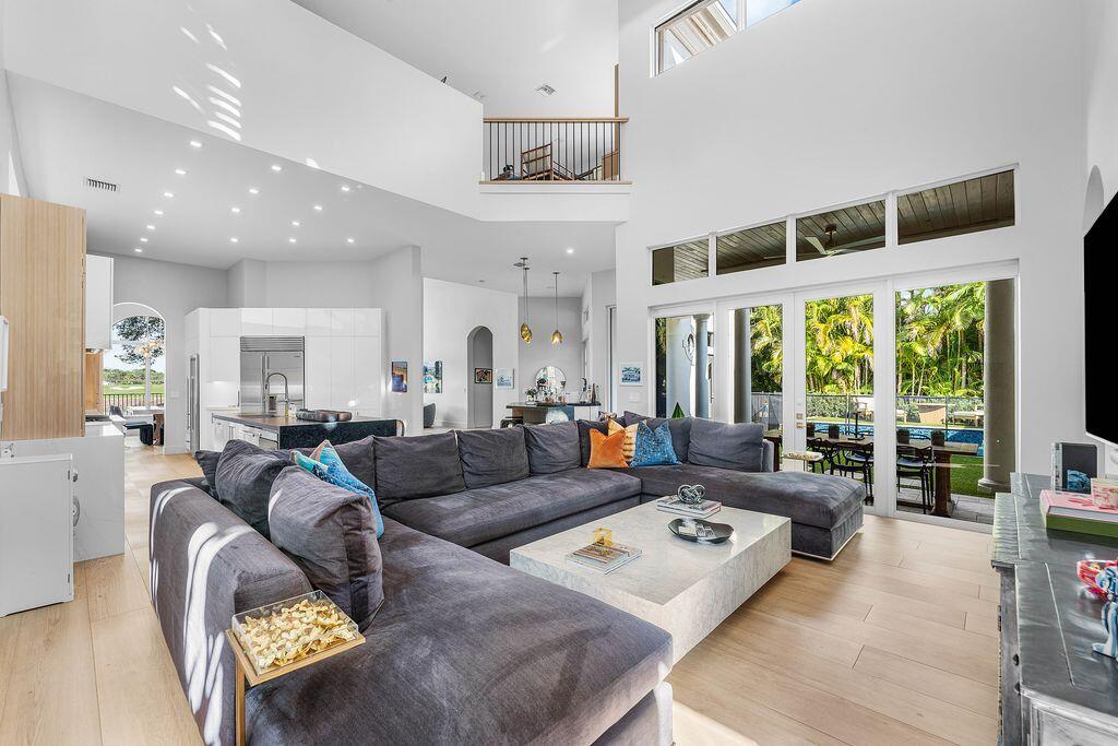 8849 Valhalla Drive Delray Beach, FL 33446 - Photo 10 of 51 a living room with furniture and a large window