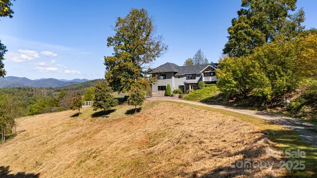 a view of a balcony with lake view and mountain view