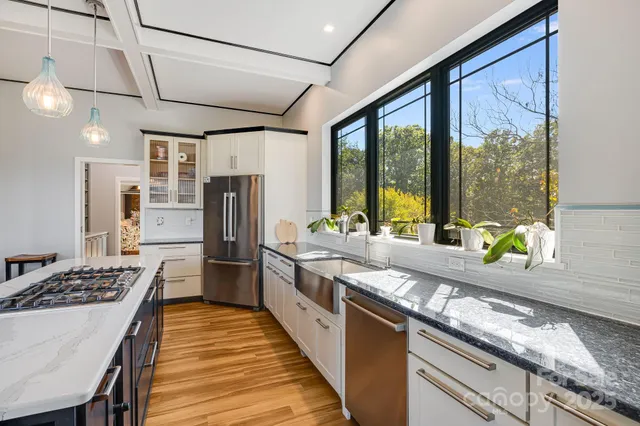 a view of a bedroom with closet and cabinet