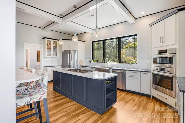 a view of a house with pool and yard
