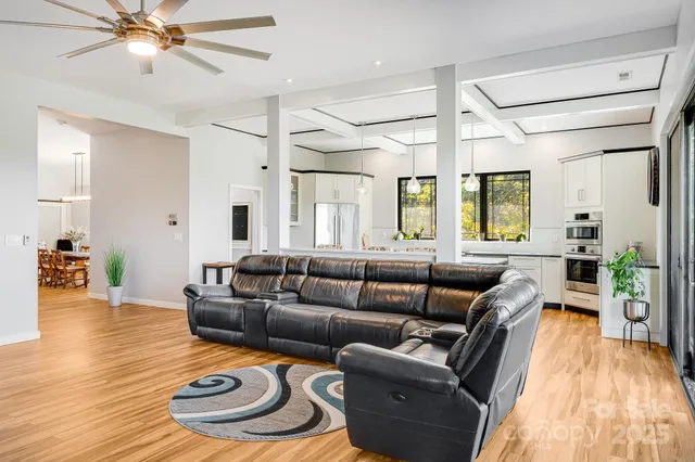 a view of a chair and table in the balcony