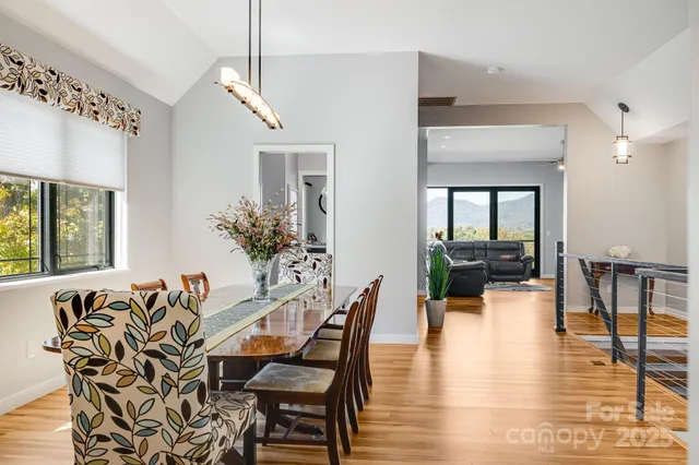 a view of a kitchen with a sink washer and dryer