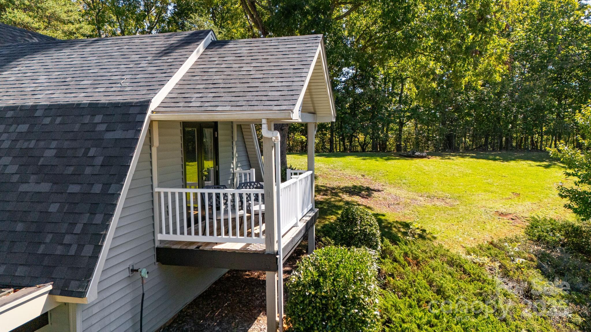1387 Woods Ammons Road Mars Hill, NC 28754 - Photo 27 of 48 a view of a house with pool and yard