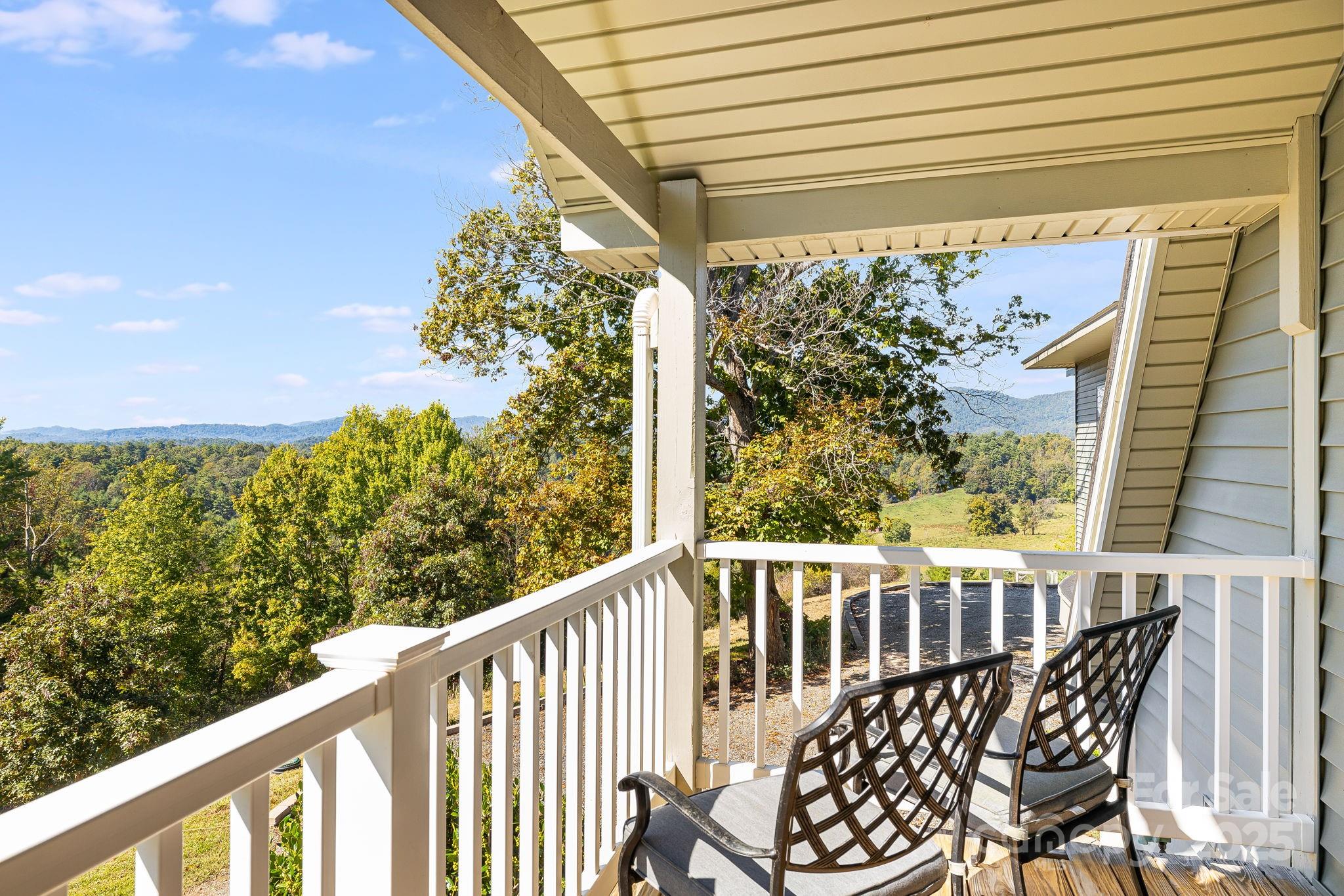 1387 Woods Ammons Road Mars Hill, NC 28754 - Photo 29 of 48 a view of a chair and table in the balcony