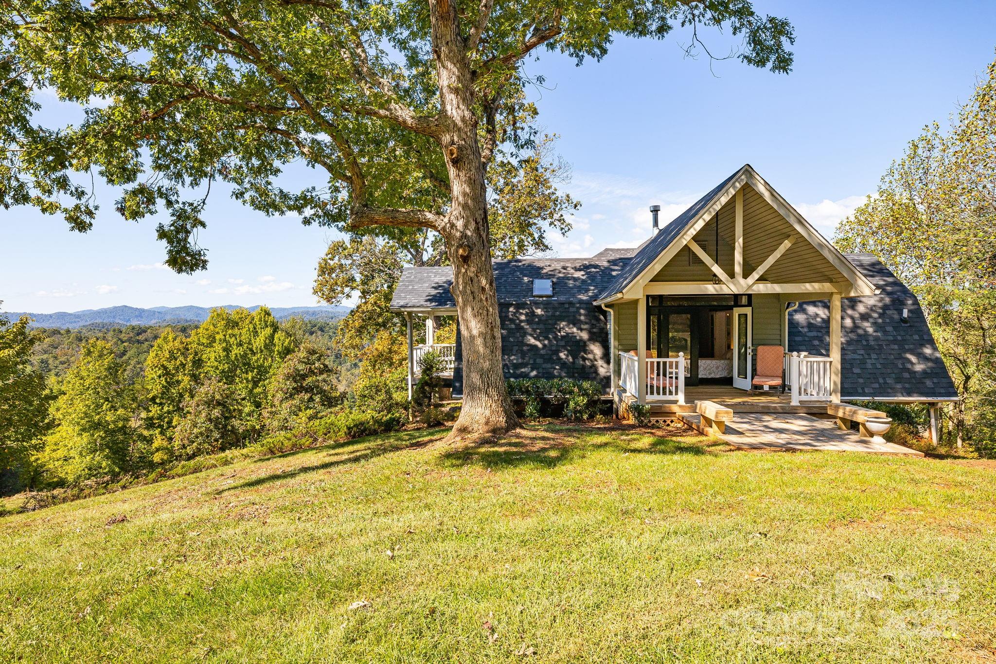 1387 Woods Ammons Road Mars Hill, NC 28754 - Photo 39 of 48 a front view of house with yard