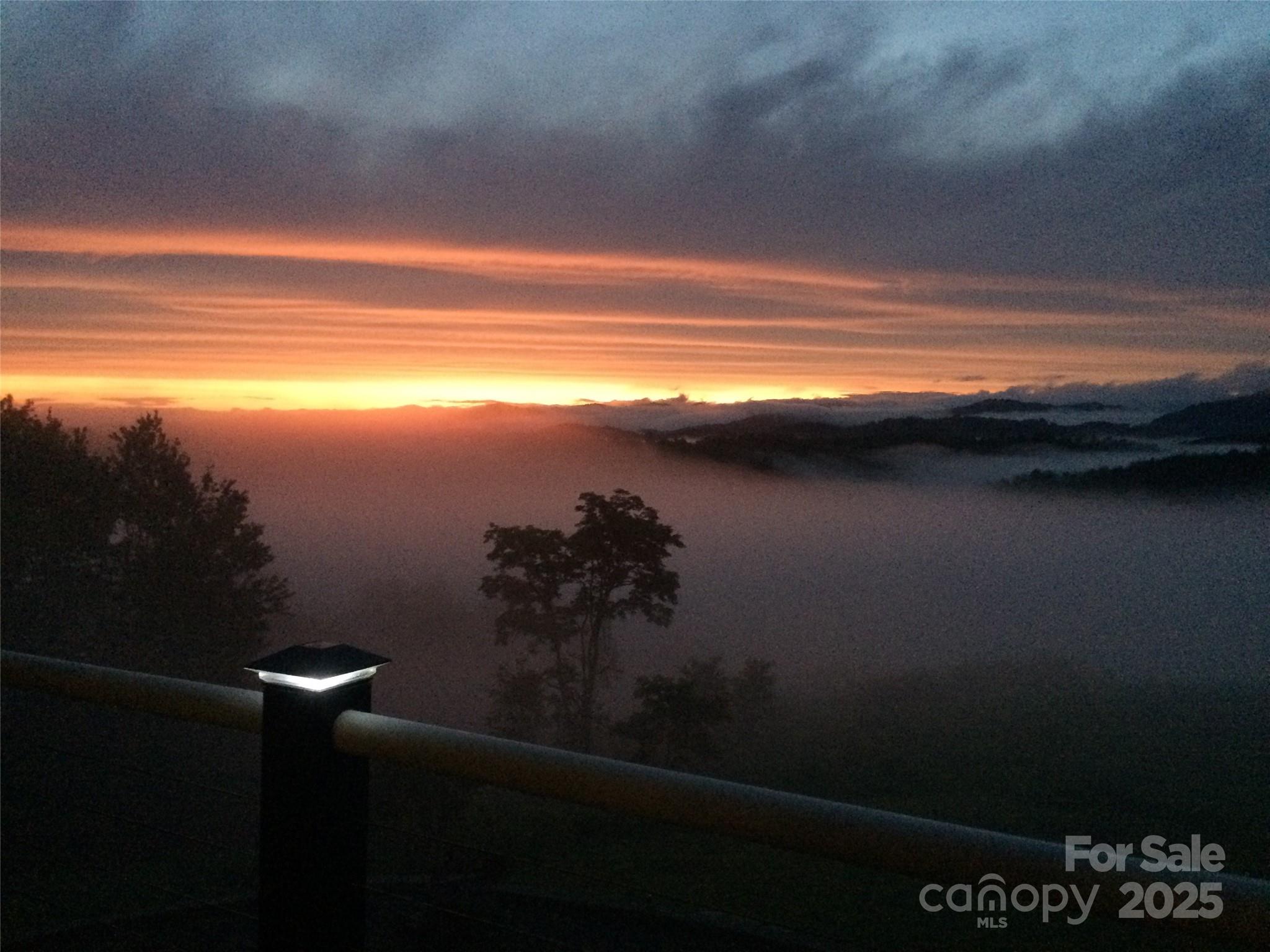 1387 Woods Ammons Road Mars Hill, NC 28754 - Photo 43 of 48 a view of a lake